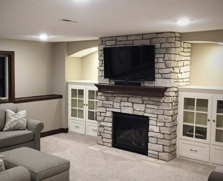 Complete home renovation - custom fireplace in high end living room design